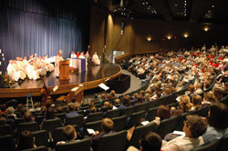 Archbishop Daniel M. Buechlein delivers his homily during an Oct. 3 Mass in honor of St. Theodora Guérin at Our Lady of Providence Jr./Sr. High School in Clarksville in the New Albany Deanery. Students from all the Catholic schools in the deanery were present for the Mass that concluded a yearlong series of liturgies in honor of Indiana’s first saint that were celebrated in each of the archdiocese’s 11 deaneries. (Photo by Sean Gallagher) 