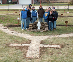 Chris Sosnowski, standing in the back row at the left with a hat and hood on his head, said the rosary walk that he and others completed outside St. Michael School in Greenfield was a community effort. “I’m really appreciative of all the work these guys put in,” he said. (Submitted photo) 