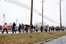 Pro-life advocates process and pray from the Movie Buff Theater at 86th Street and Michigan Road to the Planned Parenthood facility at 86th Street and Georgetown Road in Indianapolis to launch the 40 Days for Life spring campaign on Feb. 10. (Photo by Natalie Hoefer)