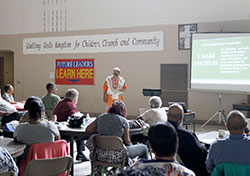 “You are important to the Church, and you are important to Jesus Christ,” Deacon Alex Jones told those gathered for an evangelization conference in the parish hall at Holy Angels Parish in Indianapolis on Sept. 19. The former Pentecostal minister, who became Catholic 14 years ago, urged his audience members to demonstrate their faith “where it’s most needed—out in the community.” (Photo by Victoria Arthur)