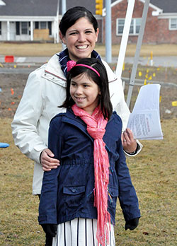 Maria Hernandez and her daughter, Sara Cabrera, wait to speak at the spring 40 Days for Life midpoint rally in front of the Planned Parenthood facility in Indianapolis on March 14. (Criterion file photo by Natalie Hoefer)