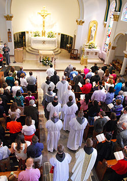 Conventual Franciscan friars process into the chapel at Mount St. Francis in Mount St. Francis on Easter Sunday, April 5, 2015. The friars of the Our Lady of Consolation Province have been based at Mount St. Francis since 1926. (Submitted photo)