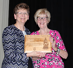 Annette “Mickey” Lentz receives the Saint Mother Theodore Guérin Award from Providence Sister Dawn Tomaszewski. (Submitted photo)