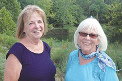 Longtime friends Cindy Woods, left, and Catharine Diehr have combined their efforts to try to lead non-Catholics to the Catholic faith at St. Therese of the Infant Jesus (Little Flower) Parish in Indianapolis. (Photo by John Shaughnessy)