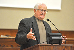 Indiana high school basketball legend Bobby Plump praises volunteers in four Catholic Charities Indianapolis programs that serve seniors during the agency’s Hoosiers for Seniors dinner event on Oct. 19 at the Archbishop Edward T. O’Meara Catholic Center in Indianapolis. (Photo by Sean Gallagher)