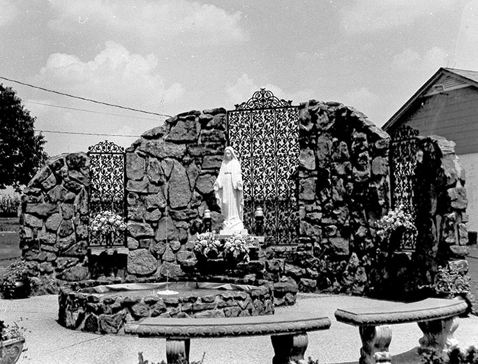 This photo shows a view of the outdoor Marian shrine at St. Mary Parish in Navilleton in the New Albany Deanery. The shrine was constructed by parishioners and blessed by Archbishop Edward T. O’Meara on Aug. 15, 1980.