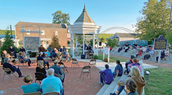 With masks and social distancing in mind, a Sept. 19 ecumenical prayer service in New Albany is held behind the Town Clock Church on Main Street. (Submitted photo)