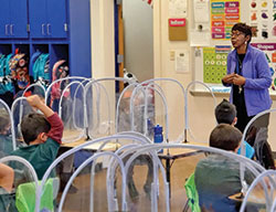 In her 34 years of dedication to Catholic education, Lillian Kelley has always felt blessed to live her dream of teaching “In this wonderful faith community.” Here, she teaches in her current school, Holy Cross Central School in Indianaolis. (Submitted photo)