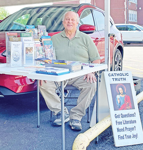 Paul Conches of St. Joseph University Parish in Terre Haute smiles outside of the soup kitchen at St. Patrick Parish in Terre Haute, ready to share the love of Christ to others through St. Paul Street Evangelization. (Submitted photo)