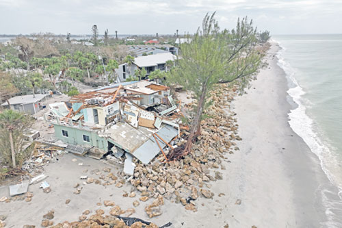 A drone view shows a destroyed beach house in Manasota Key, Fla. on Oct. 11, after Hurricane Milton made landfall on Oct. 9. As homeowners assessed damage to their property, about 200,000 customers in Florida remained without power on the morning of Oct. 15. (OSV News photo/Ricardo Arduengo, Reuters)